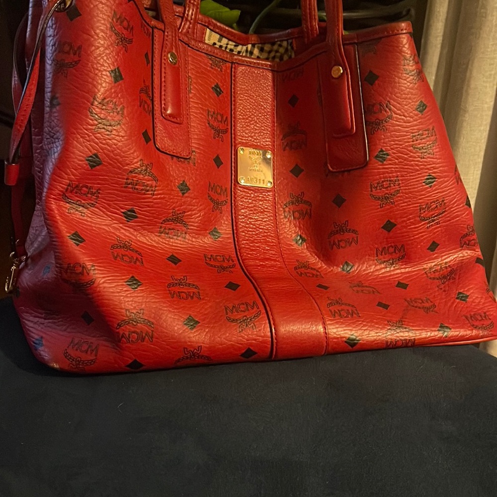 Red mcm reversible tote bag